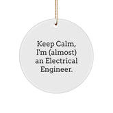 Funny Electrical Engineer Gifts from Friends, Circle Ornament for Christmas, 'Keep Calm, I'm (almost) An Electrical Engineer.' - Image 1